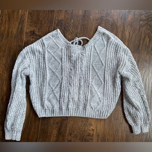 Super soft cropped sweater. Tie up back. Never worn